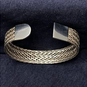 Stainless steel woven bracelet by Barbara Silverstein.
